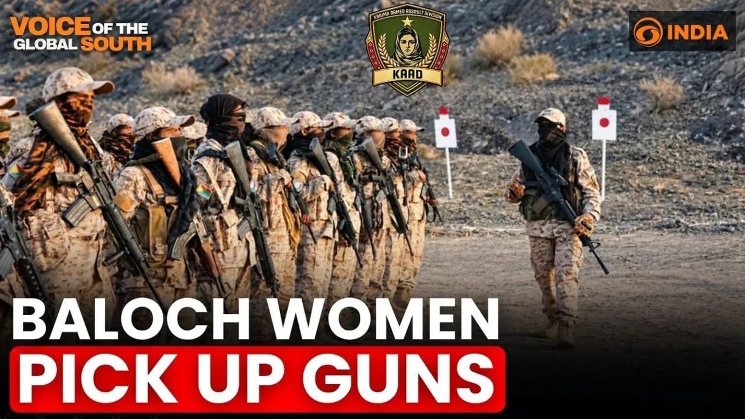 Baloch women in military fatigues and head coverings holding rifles in a desert landscape.
